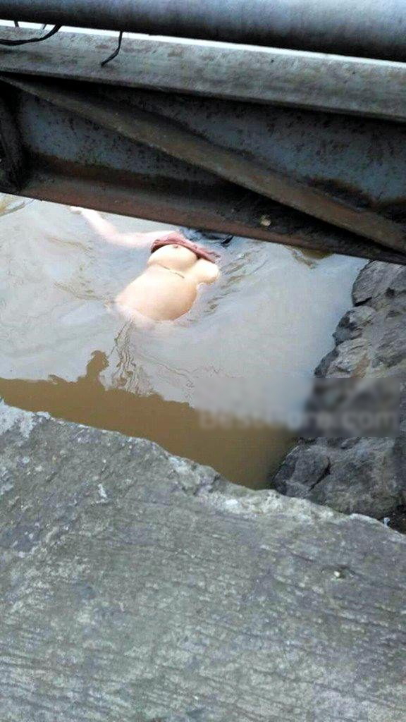 【閲覧注意】川から流れてきた爆乳女性の遺体。エロいけどグロいわ(画像)・1枚目